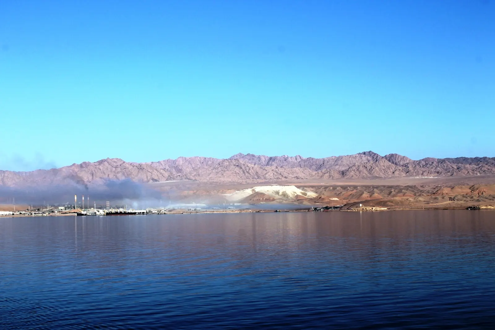 The port of Aqaba on the Red Sea with mountains behind